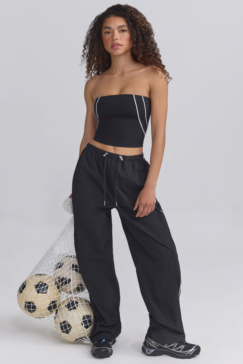 Water-Repellent Wide-Leg Track Pants in Black - 1