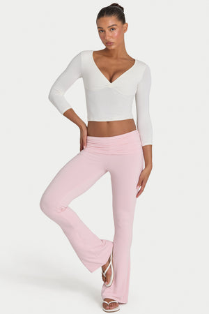 Bo+Tee model Hayley wearing the Rebloom Trousers in Blush Modal fabric perfect for yoga or pilates