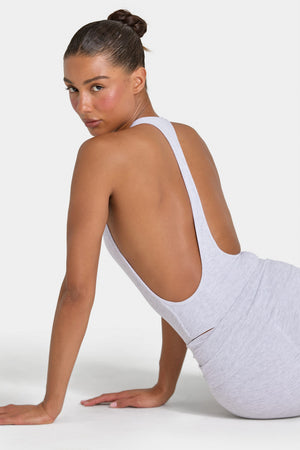 Bo+Tee model Hayley wearing the Rebloom Bodysuit in Grey Marl Modal fabric perfect for weekend lounging