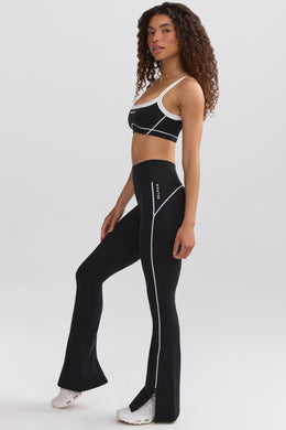 Petite Soft Active Contrast-Trim Flared Trousers in Black