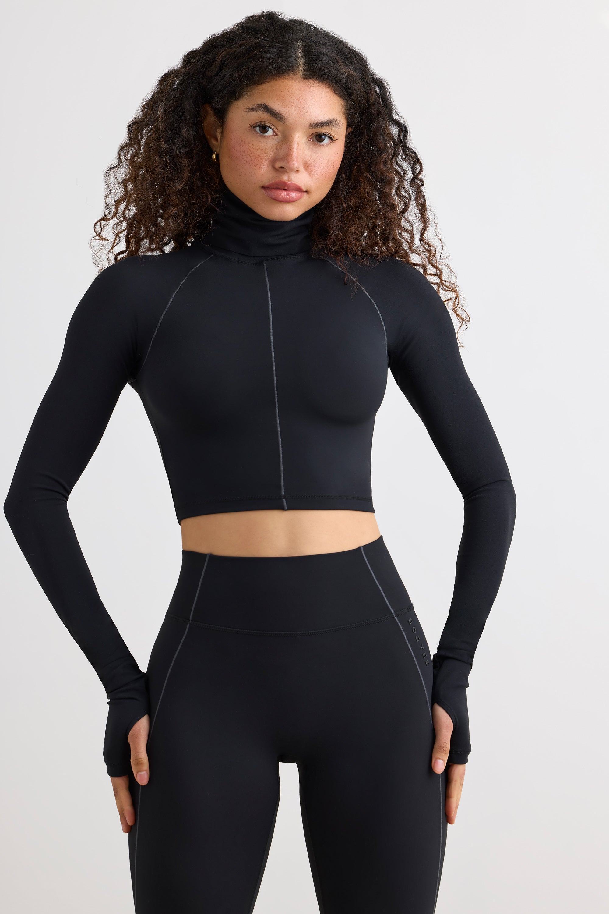 Soft Active Turtleneck Crop Top in Black | Oh Polly