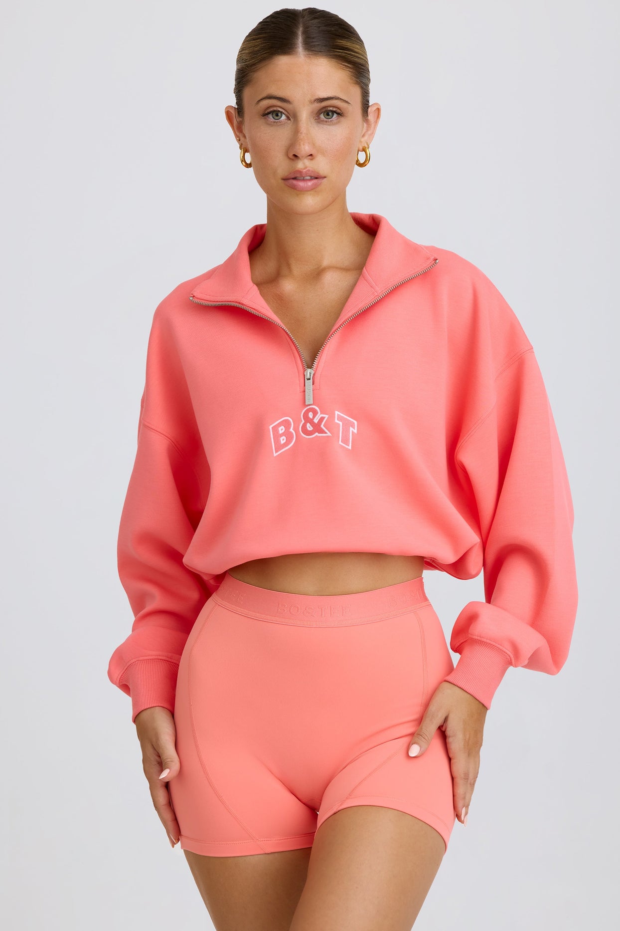 Quarter-Zip Cropped Sweatshirt in Coral