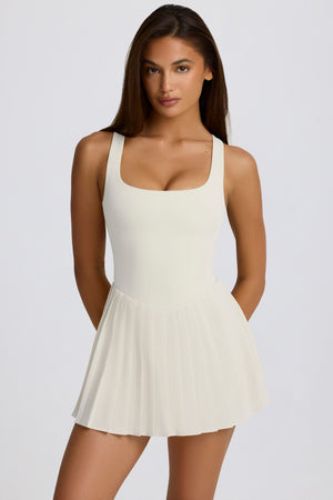 Soft Active Open-Back Pleated Tennis Dress in Ivory