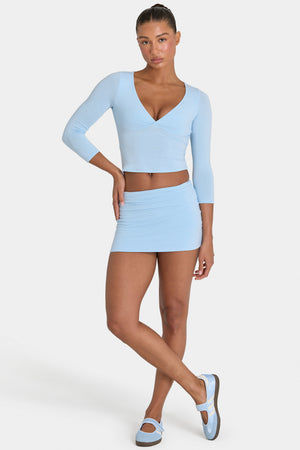 Bo+Tee model Kiele wearing the BT16355__LightBlue Skirt in Light Blue Modal fabric perfect for brunch with friends