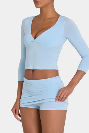 Bo+Tee model Kiele wearing the BT16355__LightBlue Skirt in Light Blue Modal fabric perfect for outdoor picnics