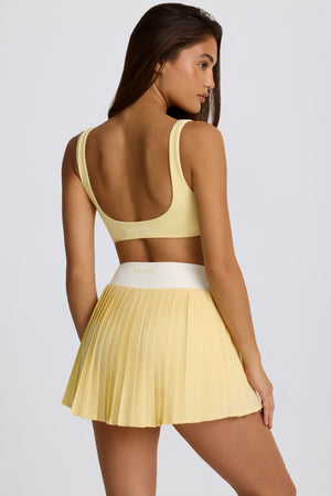 Soft Active Crossover Pleated Mini Skort in Lemon
