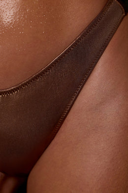 Braguitas de bikini atrevidas en marrón
