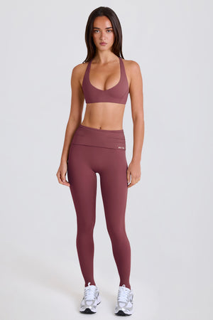 Four-Way Stretch Foldover Mid-Rise Stirrup Leggings in Acai