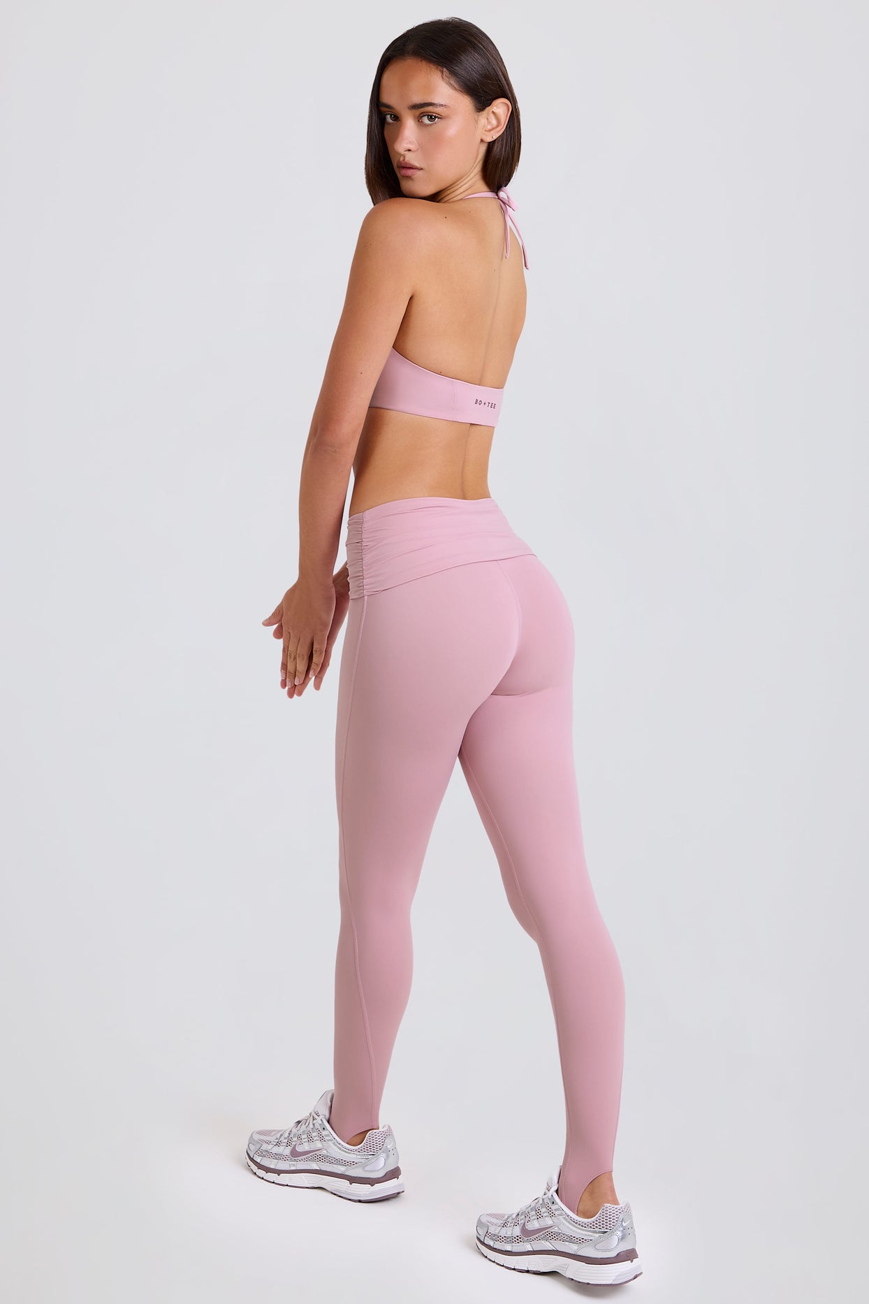 Four-Way Stretch Foldover Mid-Rise Stirrup Leggings in Mauve