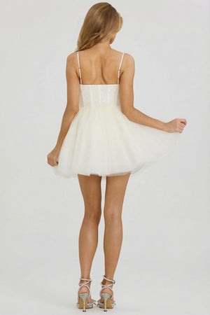 Oh Polly's Josey Anne wearing the Eugenie Mini Dress in White Embellished, Tulle fabric perfect for graduation events