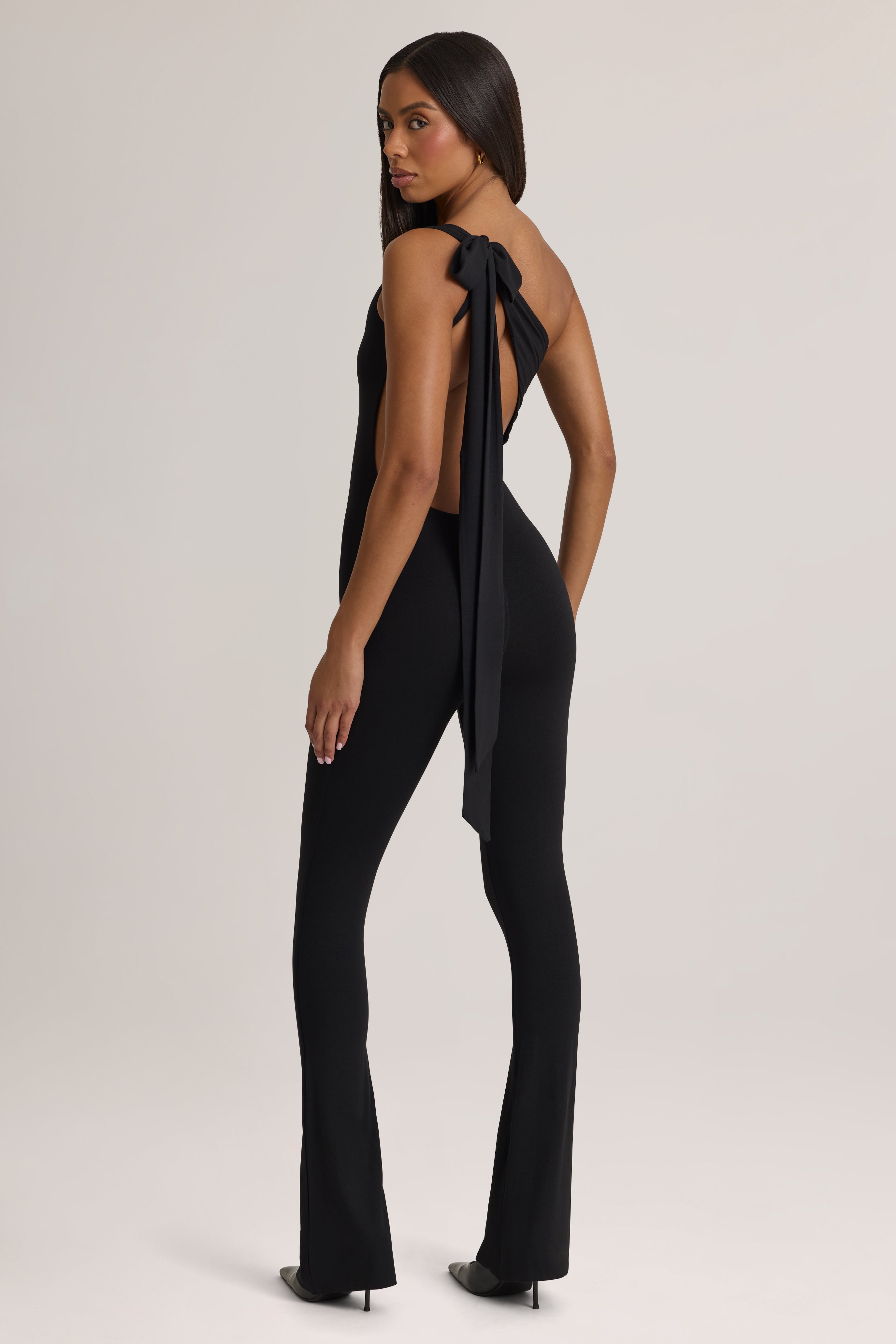 Pema Modal Lace-Trim Cut-Out Flared Jumpsuit in Black | Oh Polly