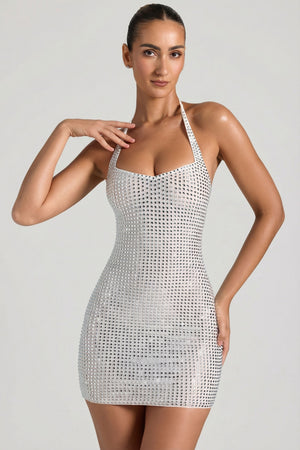 Oh Polly's Priscilla wearing the Amolika Mini Dress in White Square Hotfix fabric perfect for date night