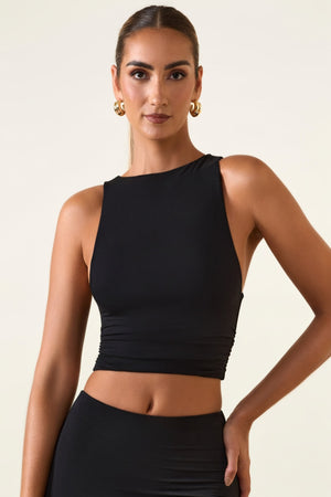 Oh Polly's Priscilla wearing the Aya Full Top in Black Modal fabric perfect for a night out
