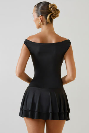 Oh Polly's Priscilla wearing the Bellona Mini Dress in Black Jersey fabric perfect for a night out