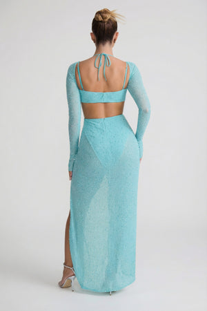 Oh Polly's Sierra Skye wearing the Champel Maxi Dress in Aqua Embellished fabric perfect for elegant evening events