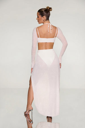 Oh Polly's Sierra Skye wearing the Champel Maxi Dress in Ivory Embellished fabric perfect for rooftop dinners