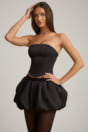 Bubble Hem Mid-Rise Mini Skirt in Black