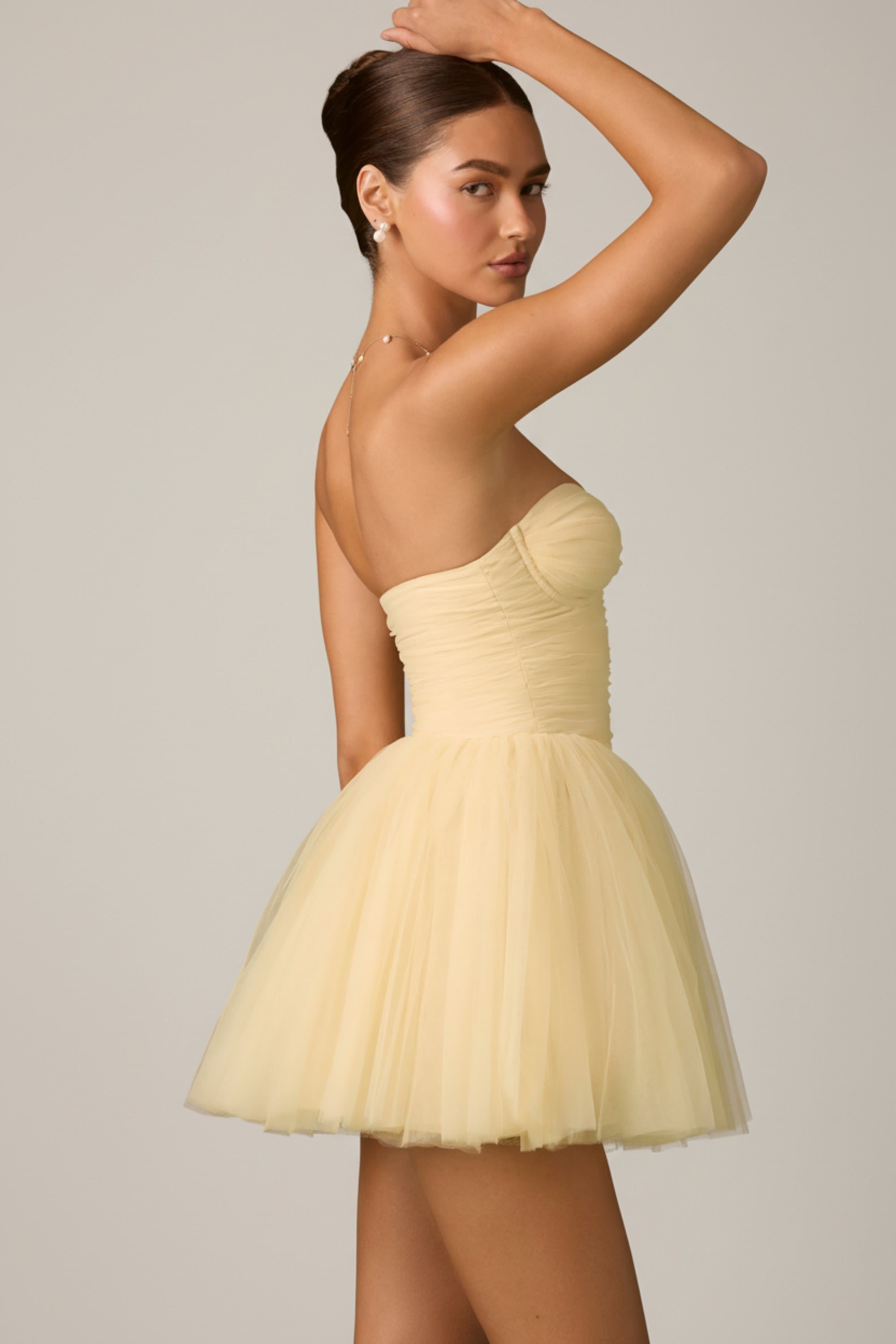 light yellow mini dress Satin Sweetheart Neck in Effortless elegance meets vibrant style with this light yellow strapless mini dress Disco Lemonade Mini Dress -