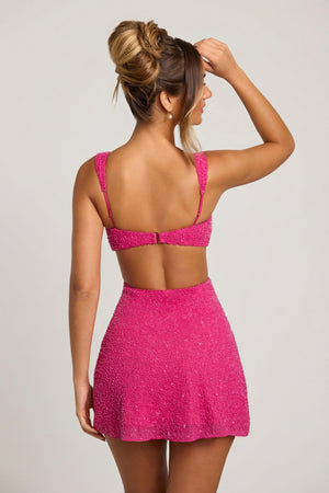 Oh Polly's Priscilla wearing the Emilion Mini Dress in Fuchsia Embellished fabric perfect for holiday dinners
