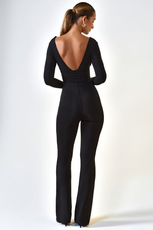 Oh Polly's Priscilla wearing the Helene Jumpsuit (reg) in Black Modal fabric perfect for dinner dates