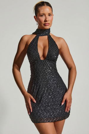 Oh Polly's Sierra Skye wearing the Henrietta Mini Dress in Black Embellished fabric perfect for a night out