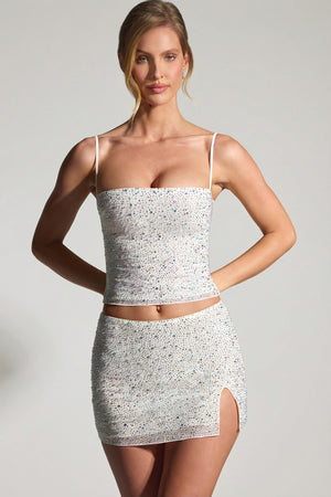 Oh Polly's Sienna wearing the Inina Mini Skirt in White Embellished fabric perfect for holiday events