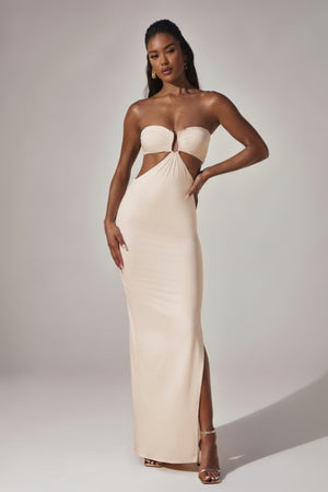 Oh Polly's Yarelis wearing the Juniper Maxi Dress in Ivory Slinky fabric perfect for summer garden parties