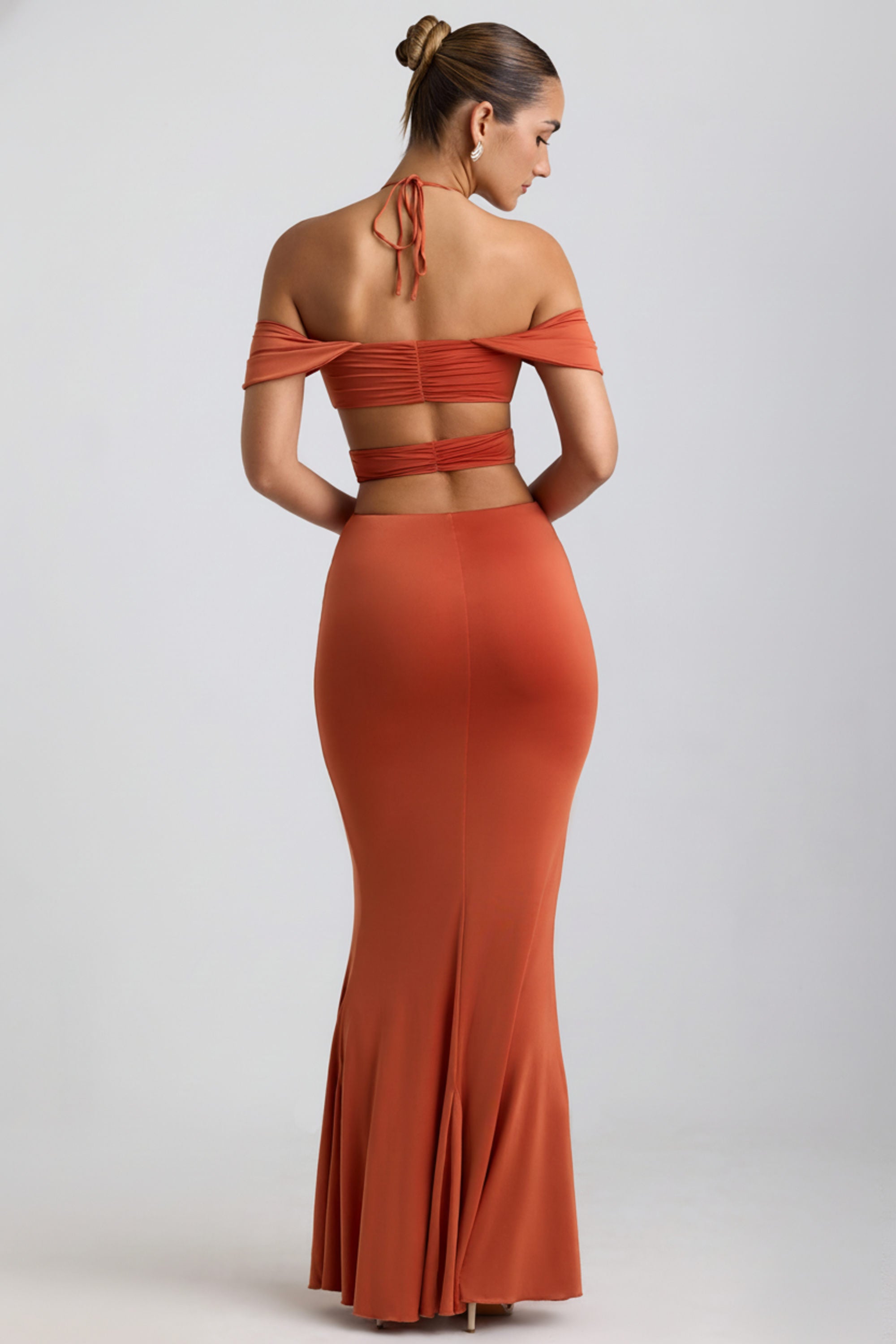 Karleen Slinky Jersey Cut-Out Halterneck Gown in Burnt Orange