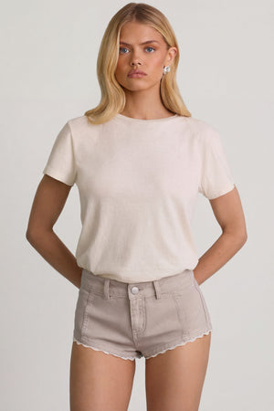 Oh Polly's Josey Anne wearing the Lanori Mini Shorts in Ecru Denim fabric perfect for summer brunches