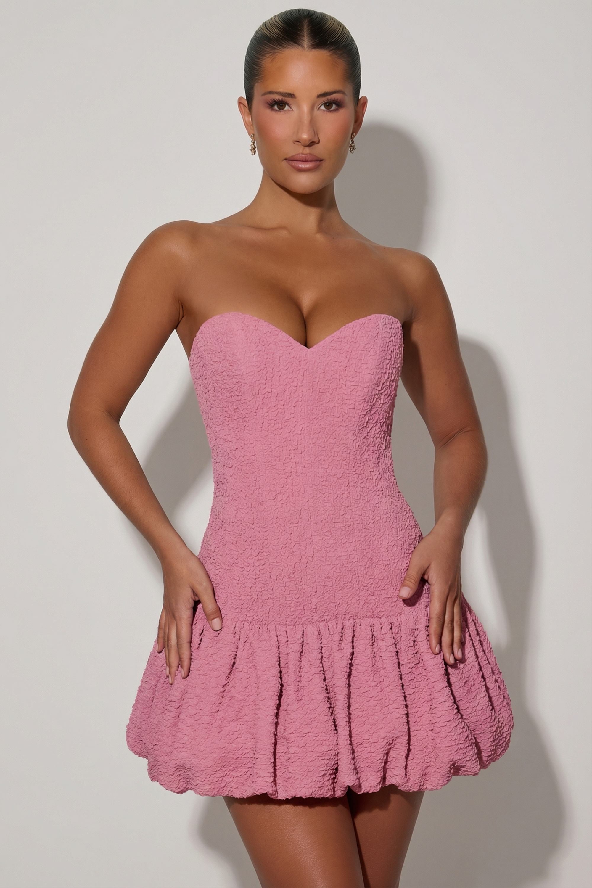 Cut-Out Bubble Hem Corset Mini Dress in Dusty Pink