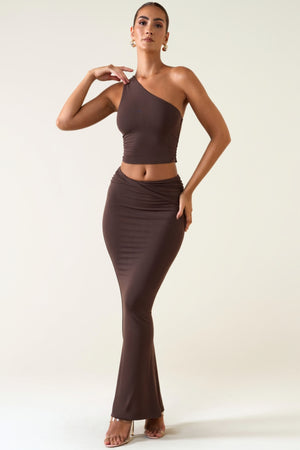 Oh Polly's Priscilla wearing the Lena Maxi Skirt in Chocolate Brown Modal fabric perfect for a rooftop cocktail night