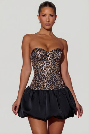 Oh Polly's Sierra Skye wearing the Maribel Mini Dress in Leopard Satin fabric perfect for a night out