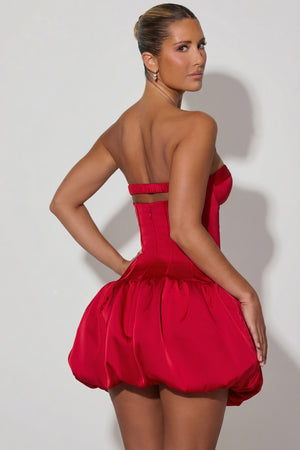 Oh Polly's Sierra Skye wearing the Maribel Mini Dress in Red Satin fabric perfect for special occasions