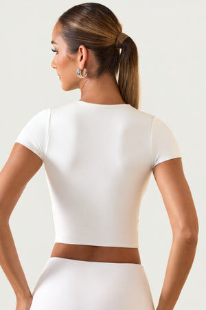 Oh Polly's Priscilla wearing the Myaree Crop Top in White Modal fabric perfect for beach getaways