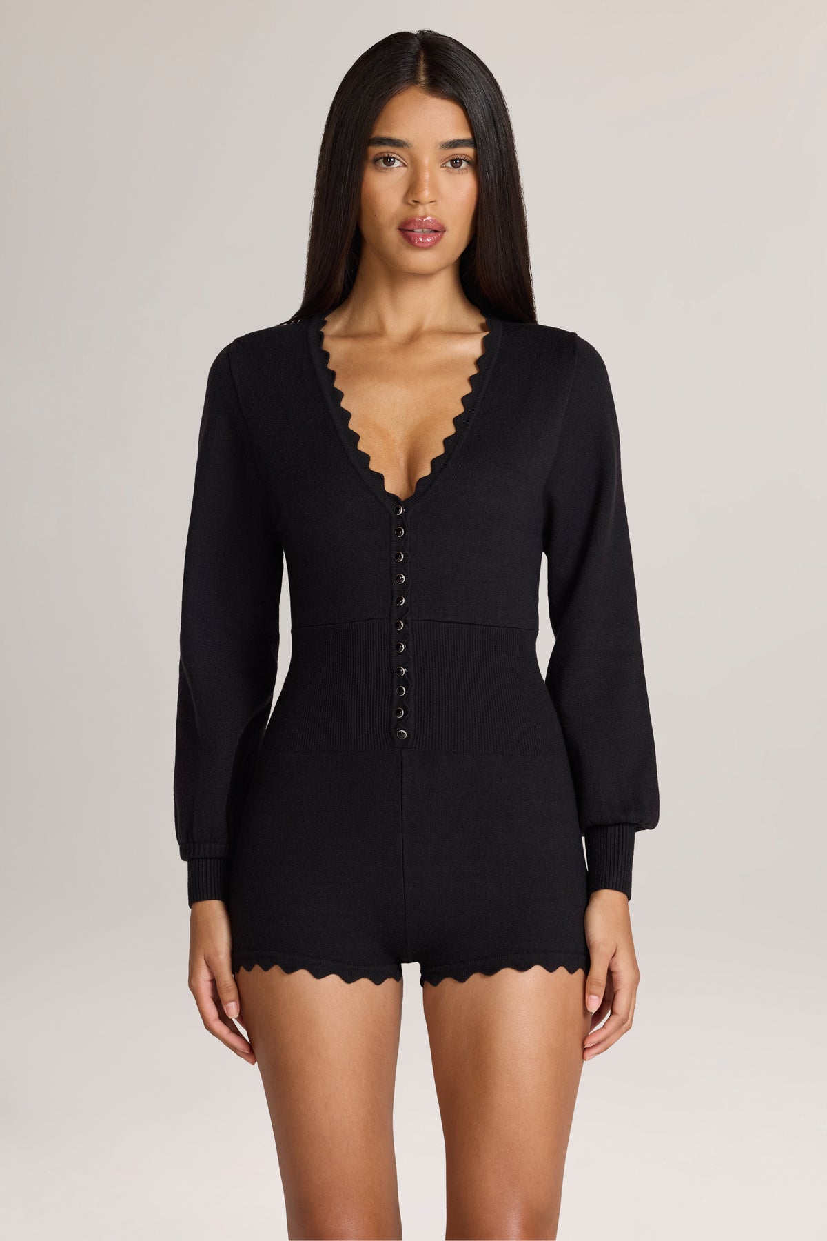 Knit Long-Sleeve Romper in Black