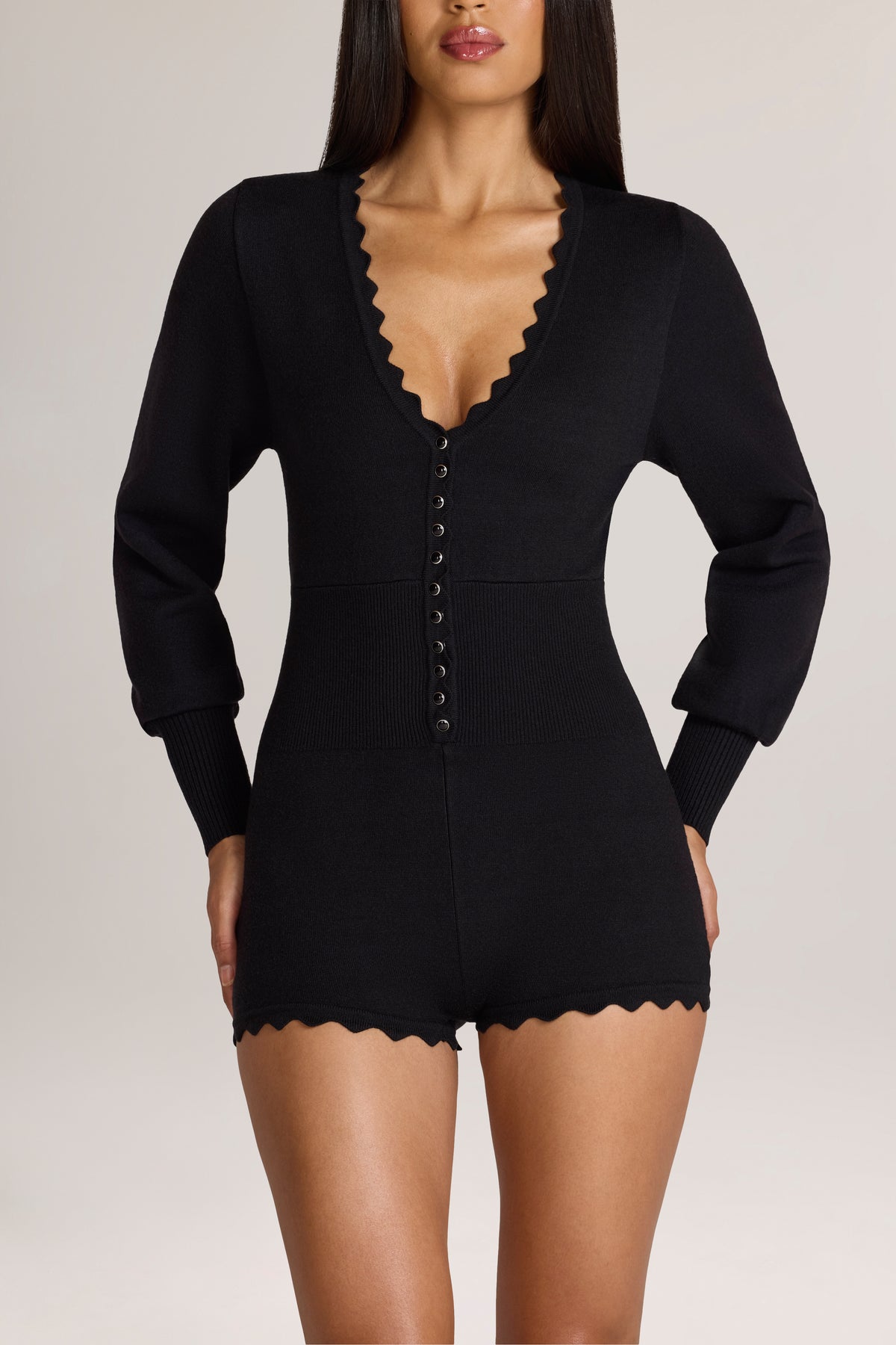 Knit Long-Sleeve Romper in Black