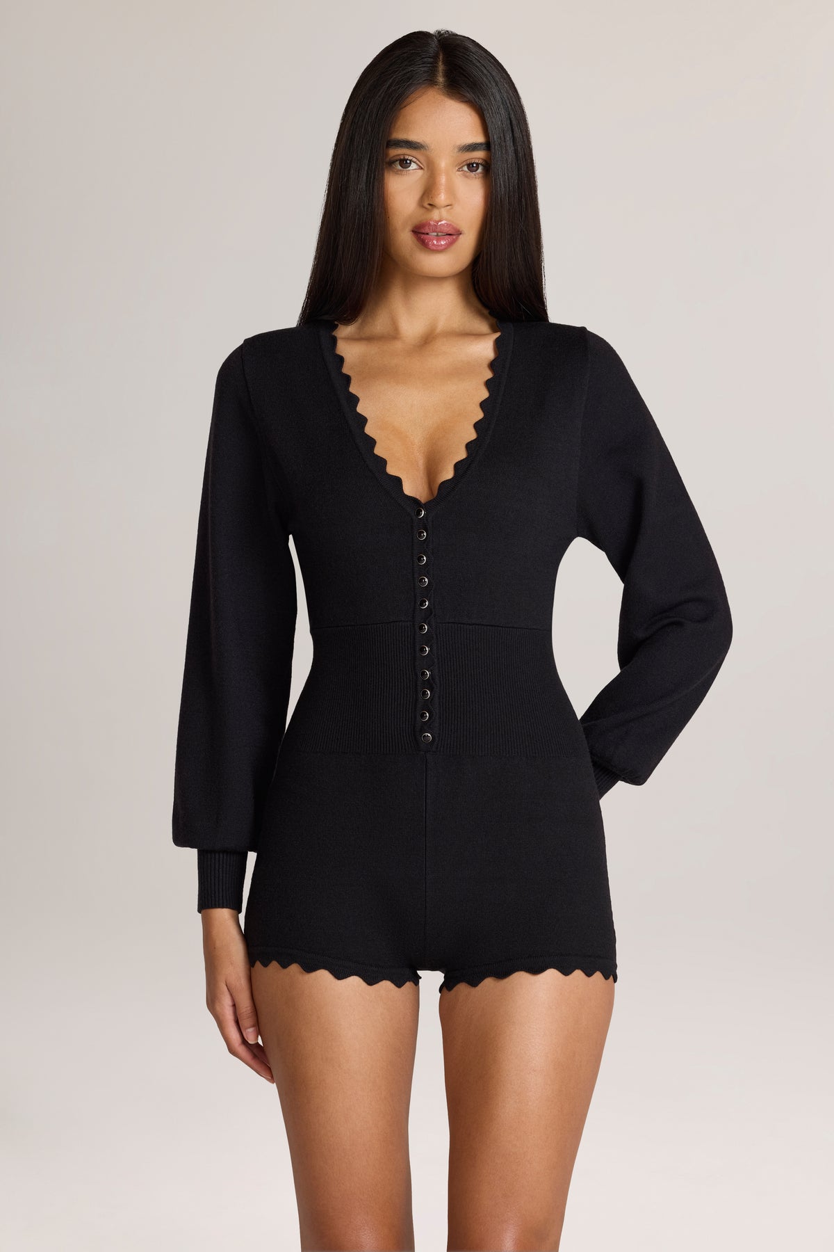 Knit Long-Sleeve Romper in Black
