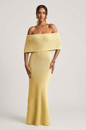 Oh Polly's Priscilla wearing the Naia Maxi Dress in Yellow Boucle Knit fabric perfect for summer garden parties