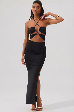 Oh Polly's Yarelis wearing the Oceane Maxi Dress in Black Slinky fabric perfect for a formal evening