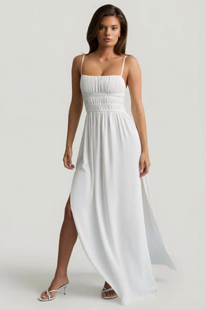 Oh Polly's Sophia wearing the Olyssia Maxi Dress in White Georgette fabric perfect for elegant soirées