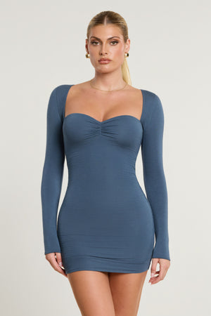 Oh Polly's Kiele wearing the Perrie Mini Dress in French Navy Modal fabric perfect for a night out