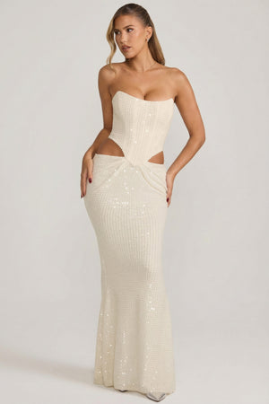 Oh Polly's Kara wearing the Saphira Gown Length Dress in White Sequin fabric perfect for red carpet occasions