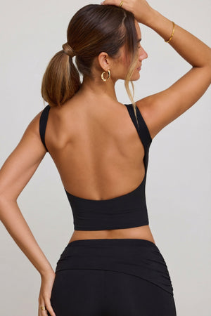 Oh Polly's Priscilla wearing the Wren Crop Top in Black Modal fabric perfect for weekend parties