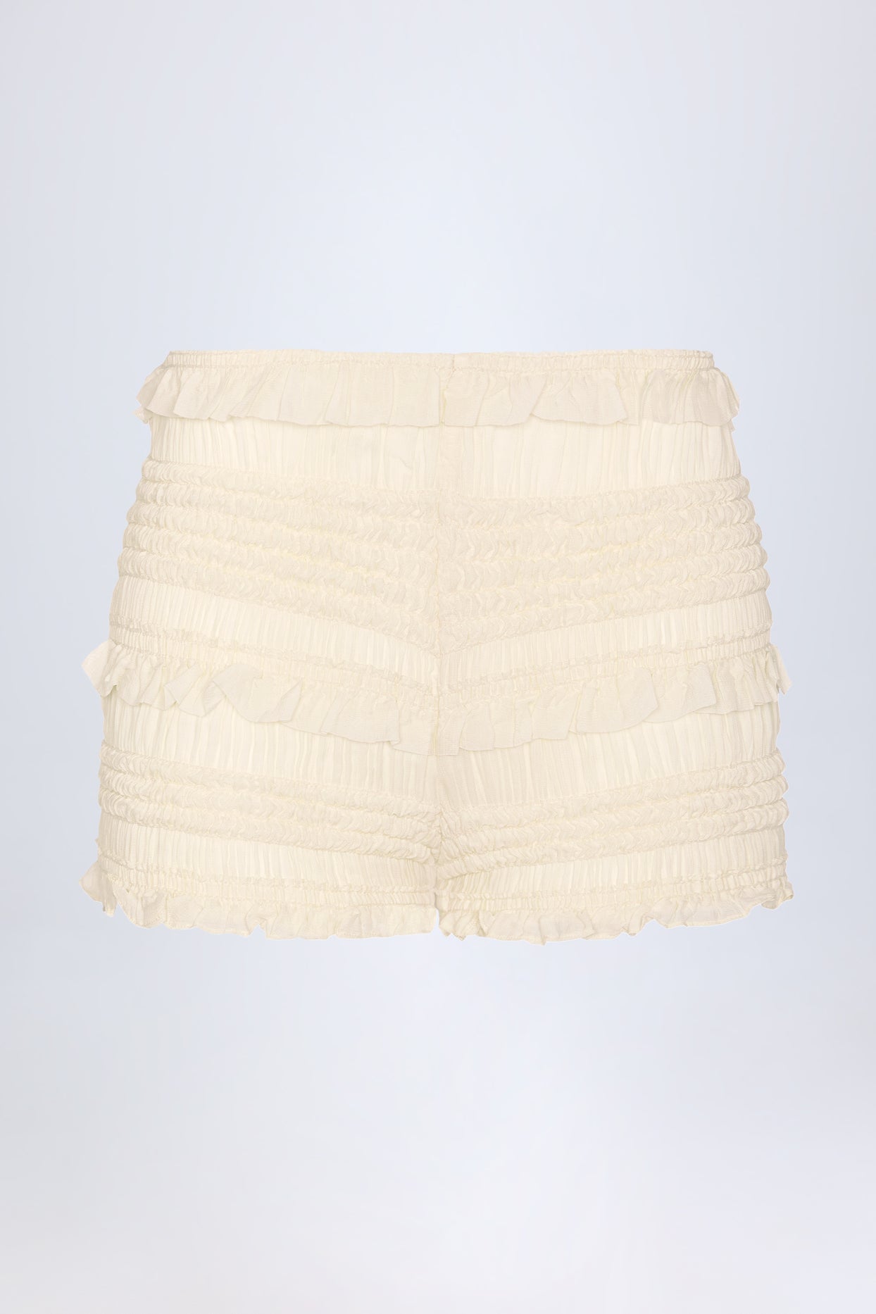 Ruffled Mid-Rise Shorts in Ivory - 1