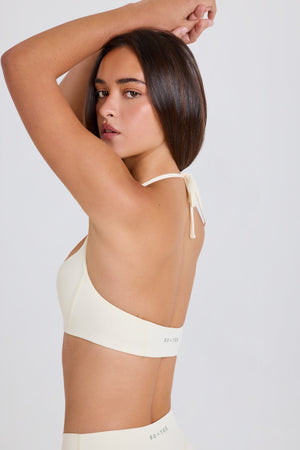 Four-Way Stretch Scoop-Neck Halterneck Sports Bra in Cream