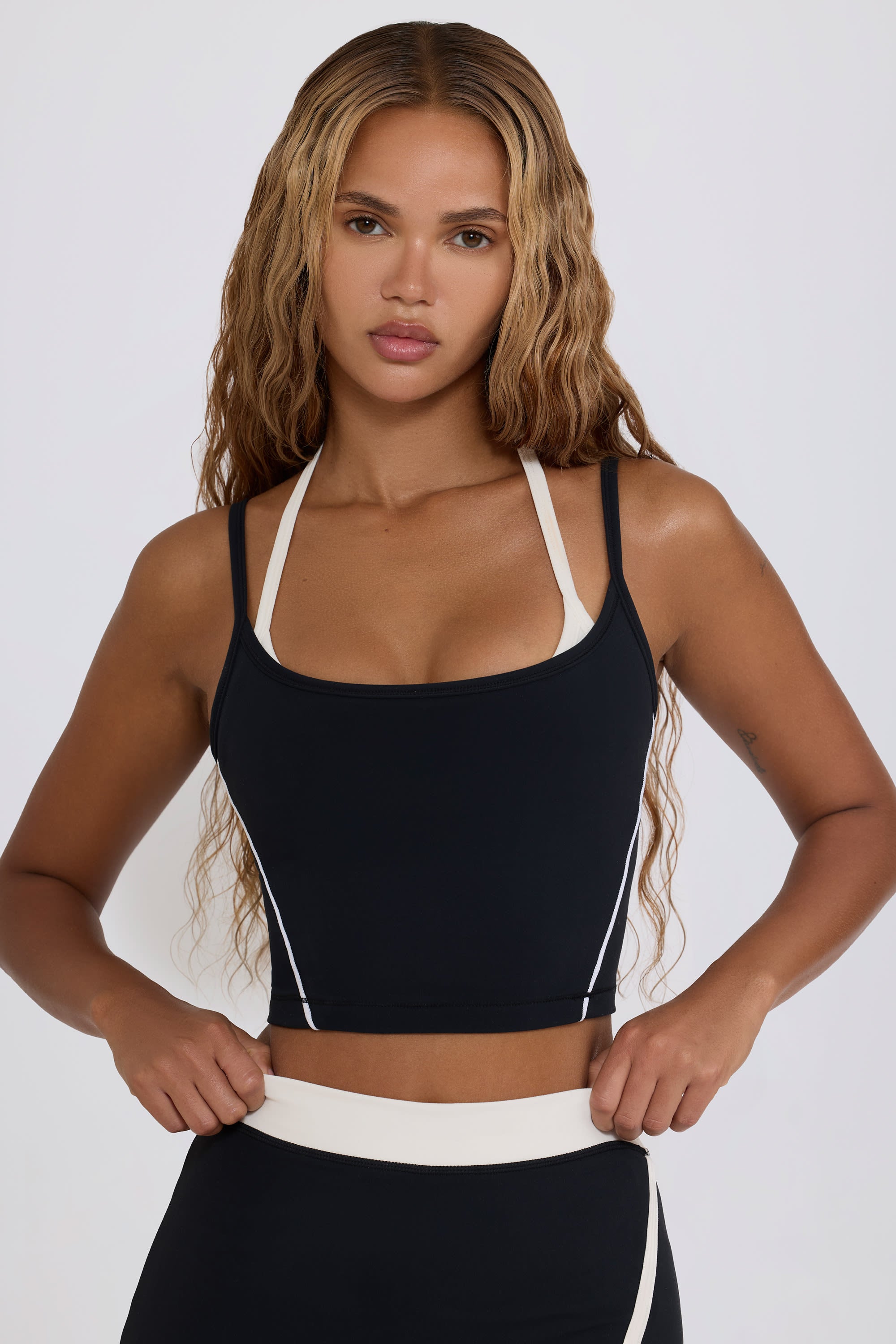 Soft Active Layered Cropped Tank Top in Black | Oh Polly