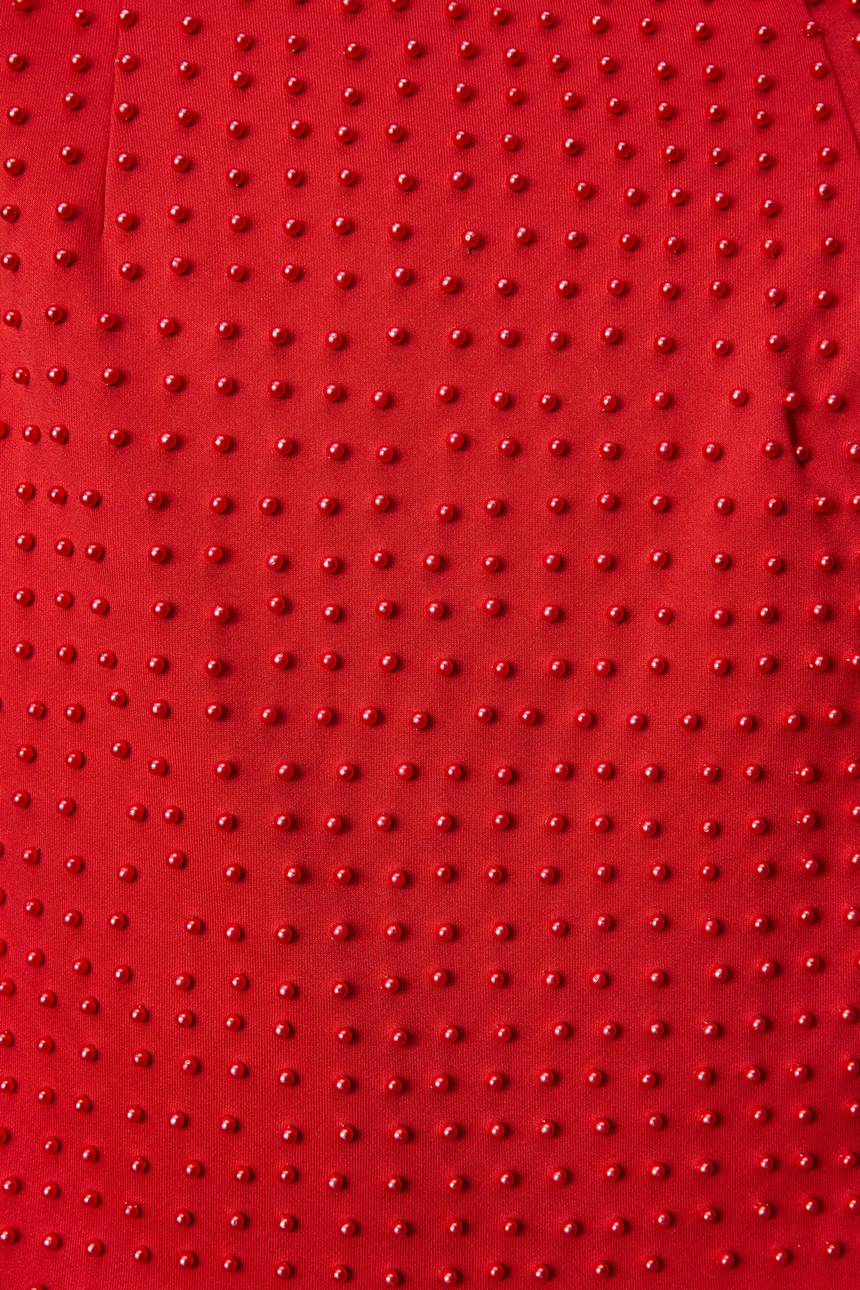 Minissaia embelezada ponto a ponto em vermelho