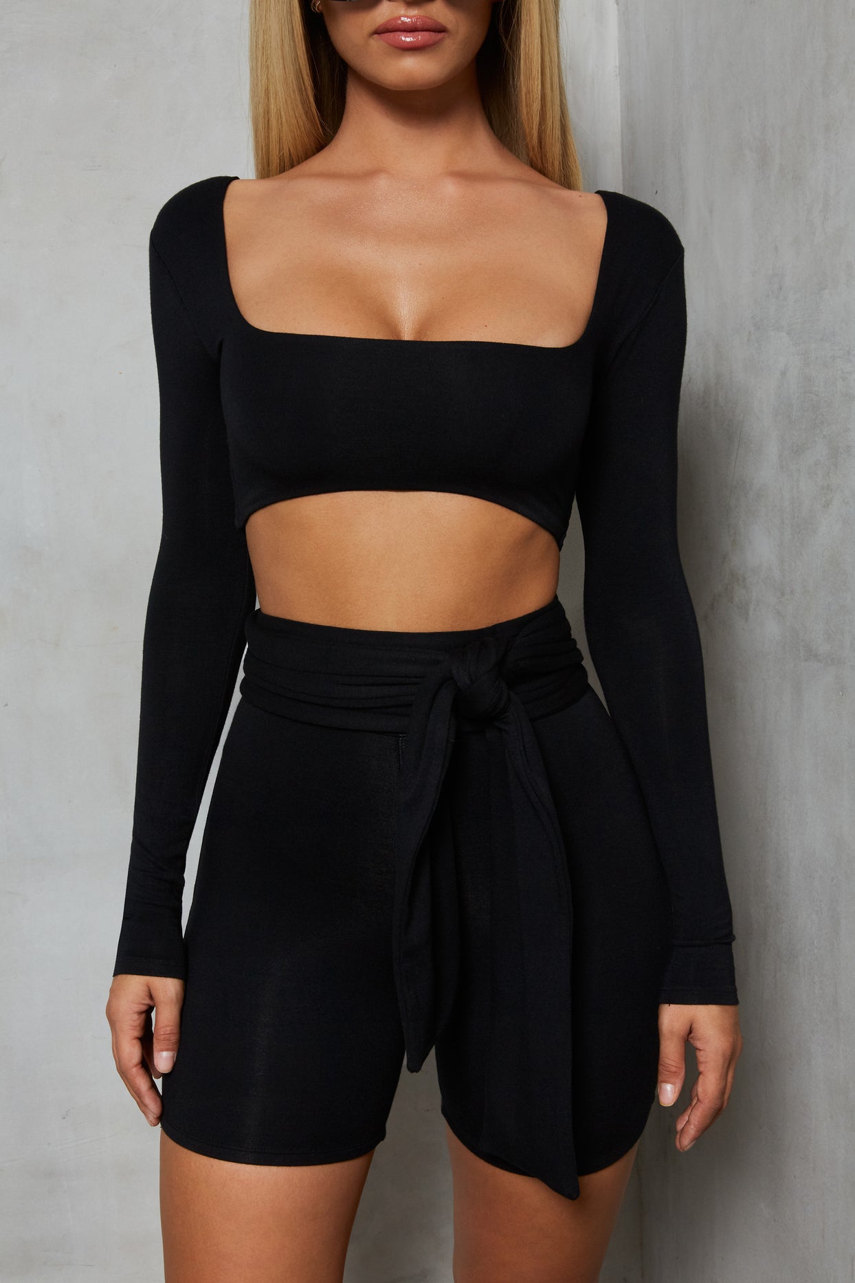 Shorty On The Side Long Sleeve Crop Top in Black