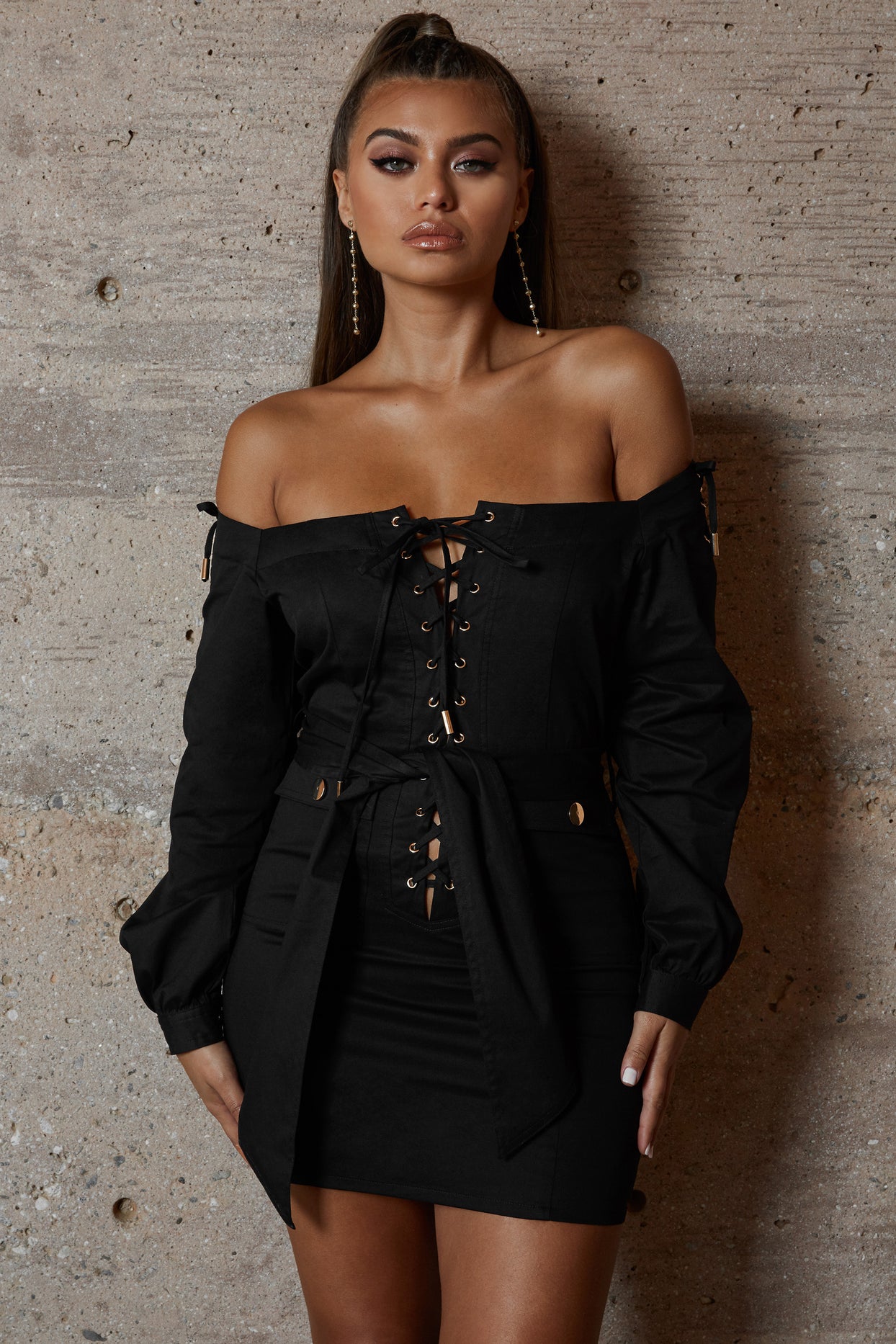 Tongue Tied Off The Shoulder Mini Dress in Black