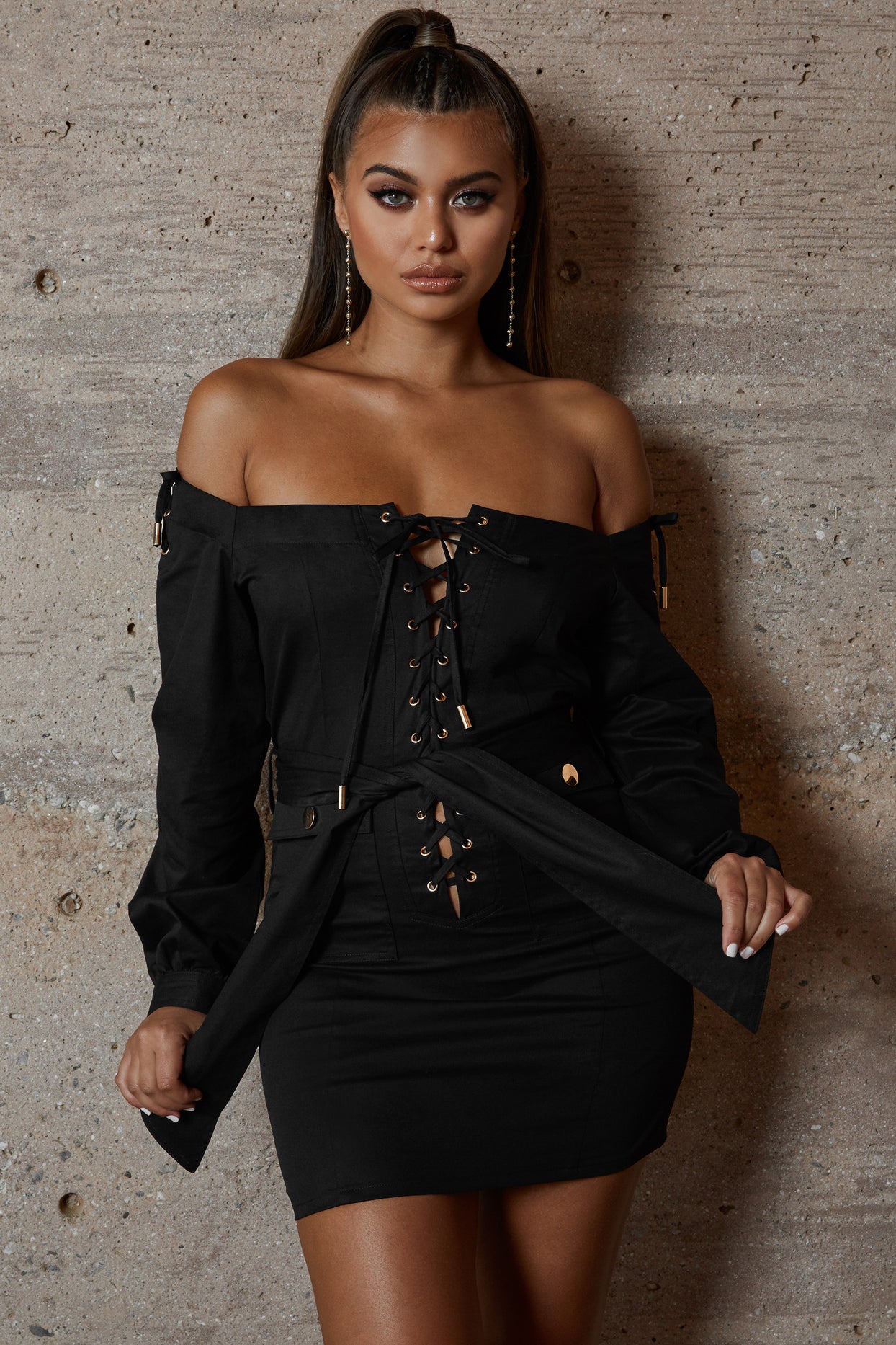 Tongue Tied Off The Shoulder Mini Dress in Black